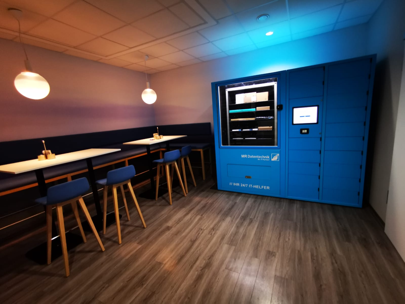 OfficeButler24 locker wall with teal lighting